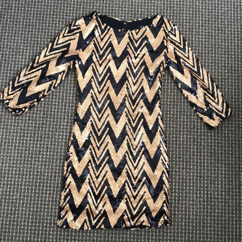 Gorgeous black and gold sequin dress
